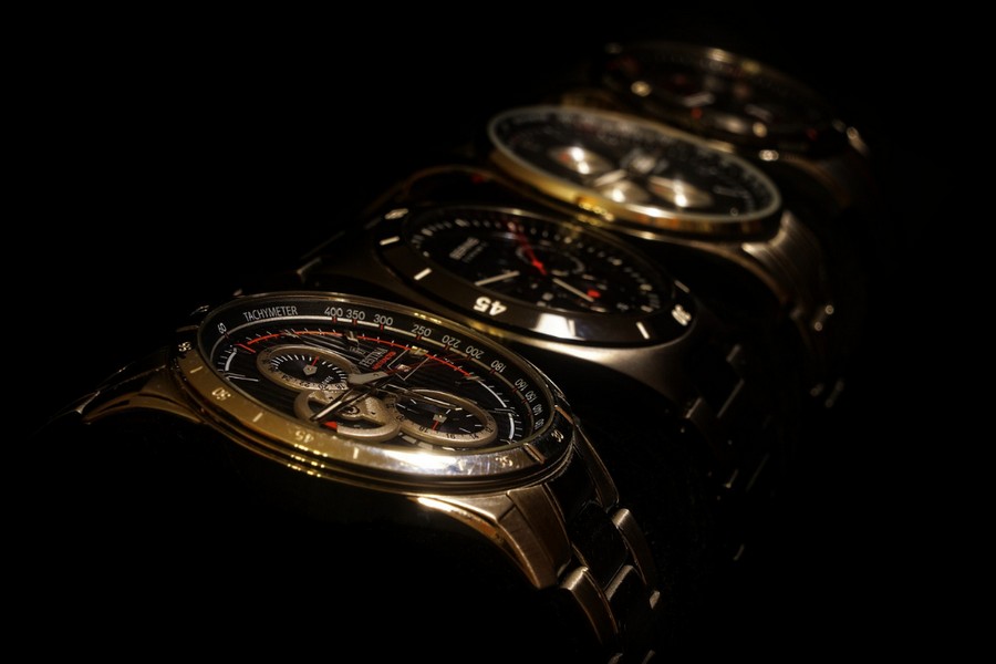 gold watches lined side-by-side
