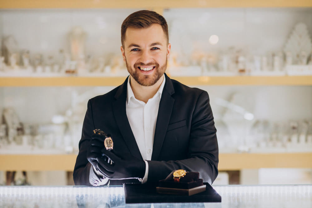 man receiving a watch being sold